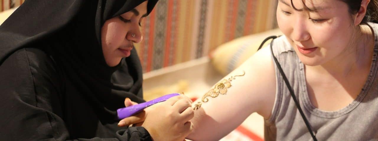 henna painting in safari adventures UAE